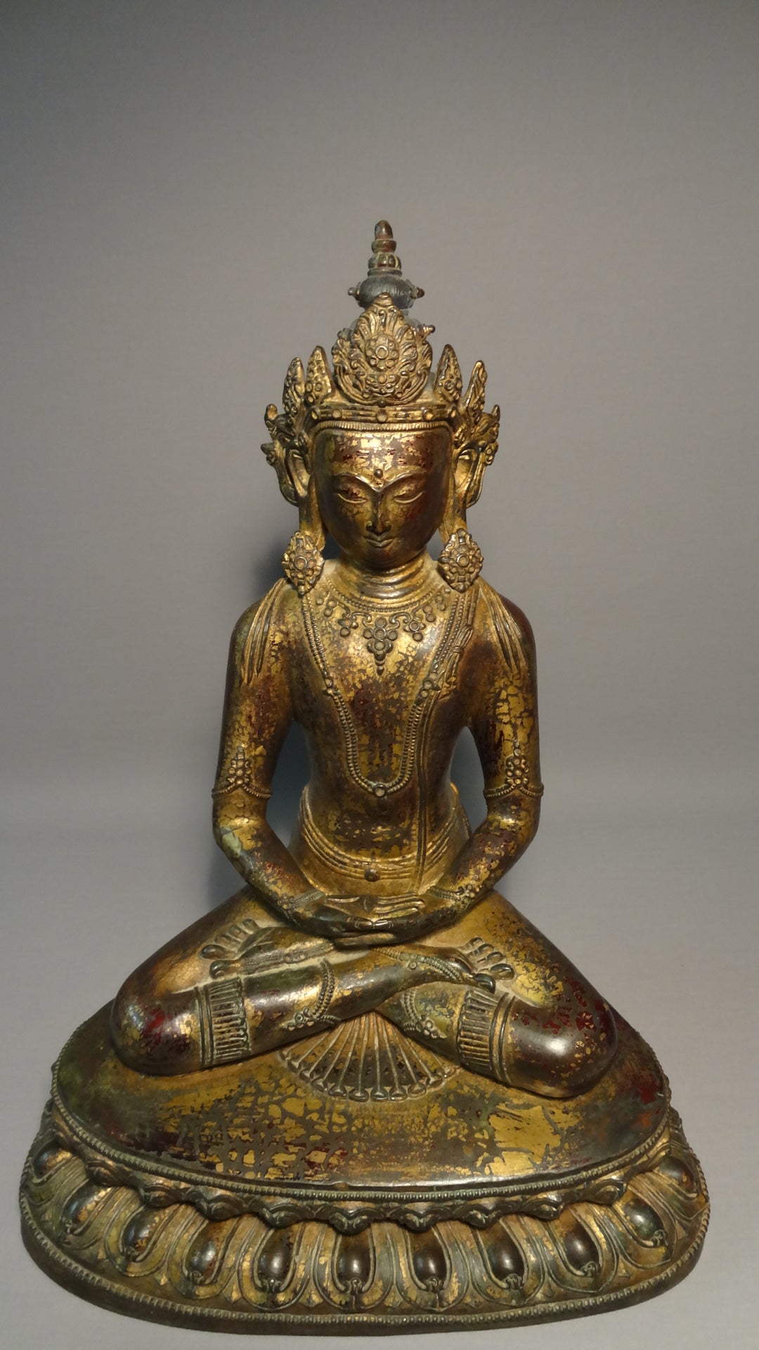 A fine and large Gilt bronze Sino-Tibetan seated figure of Amitayus 19thC
