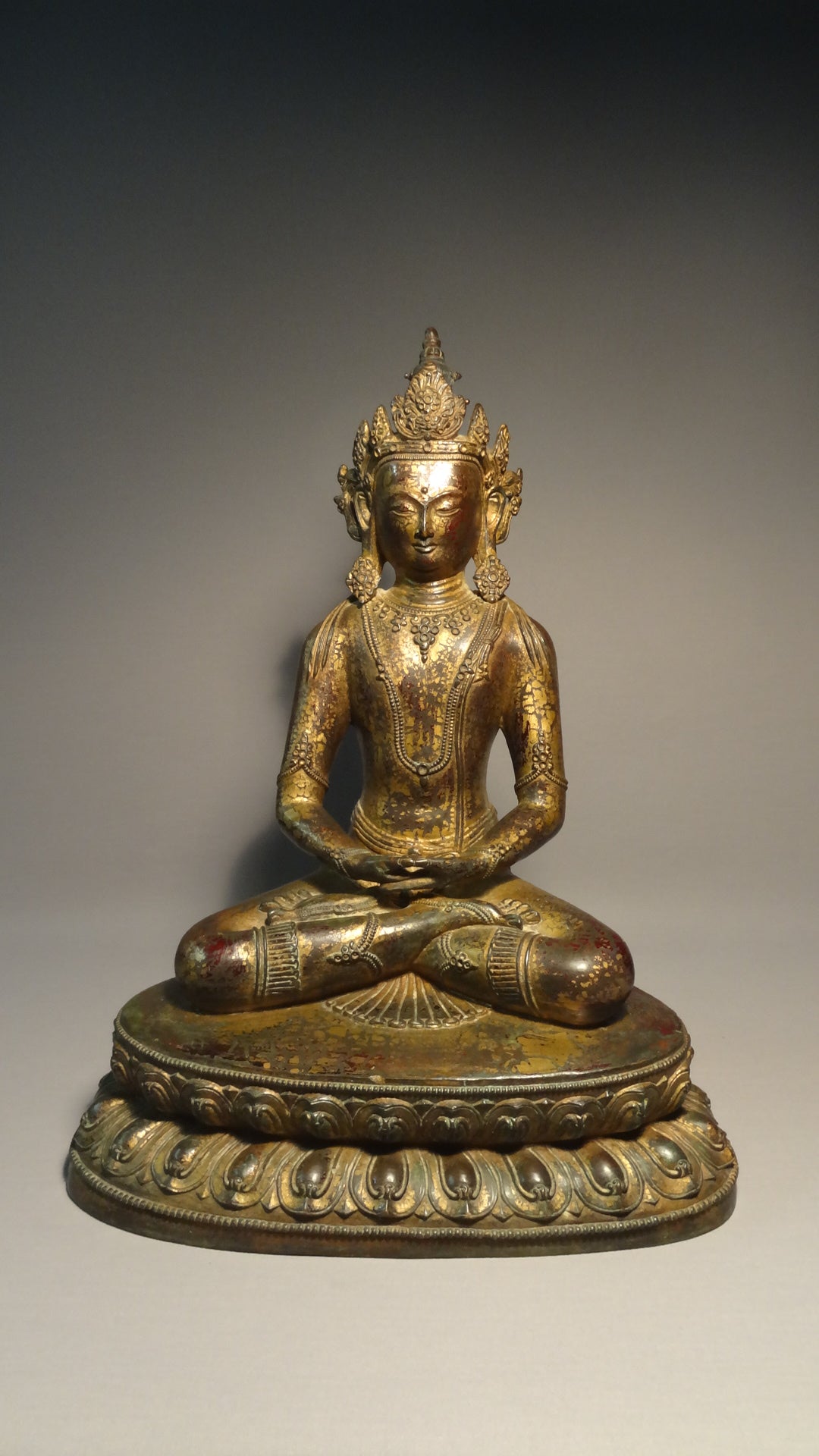 A fine and large Gilt bronze Sino-Tibetan seated figure of Amitayus 19thC