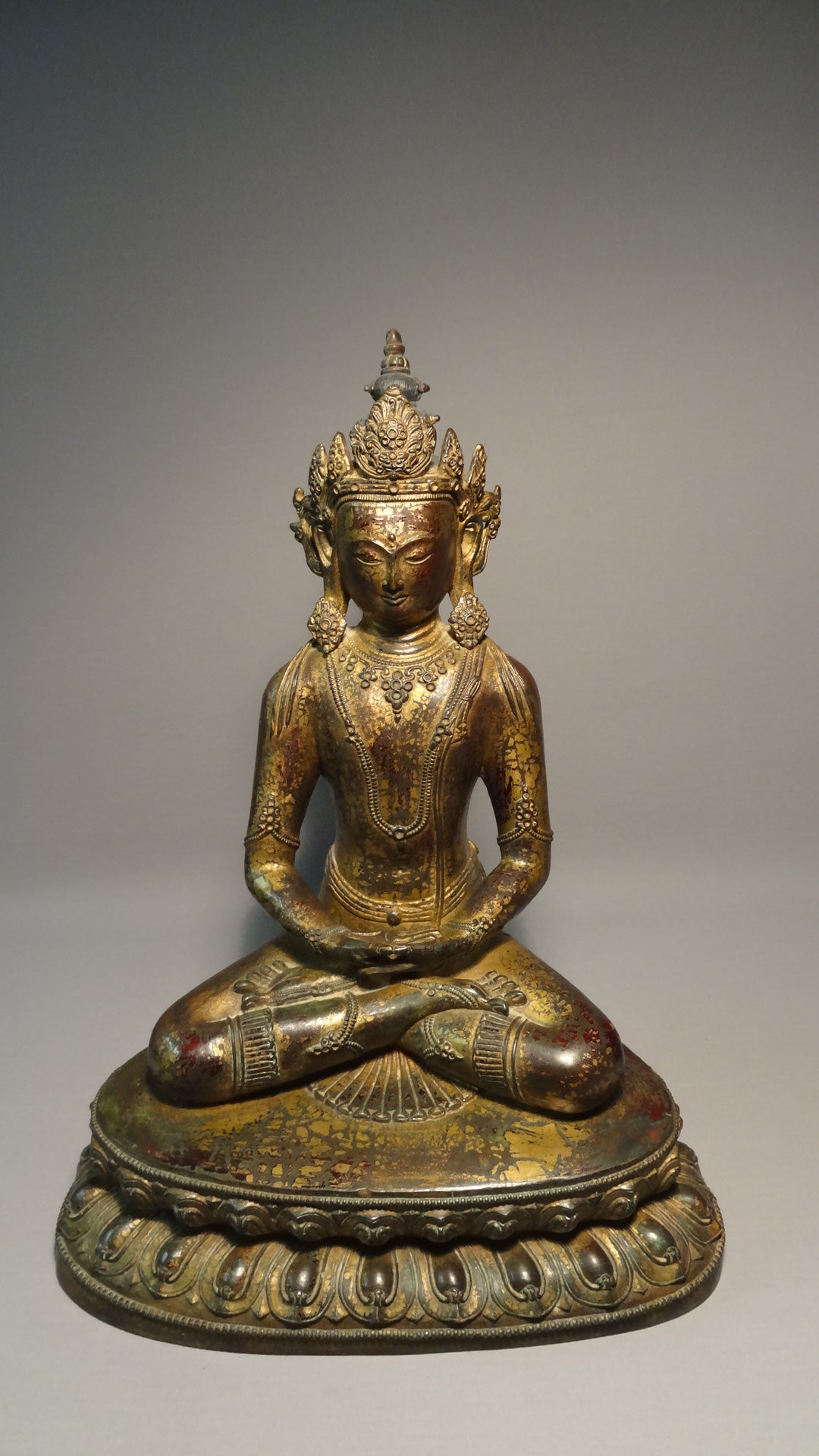 A fine and large Gilt bronze Sino-Tibetan seated figure of Amitayus 19thC
