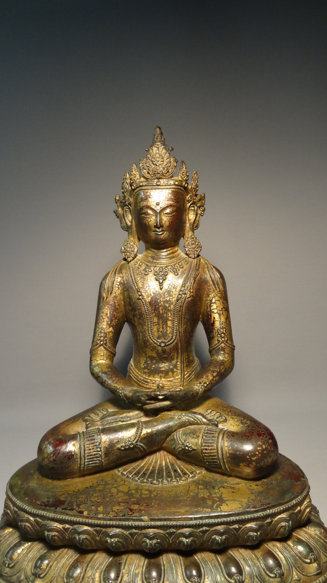 A fine and large Gilt bronze Sino-Tibetan seated figure of Amitayus 19thC